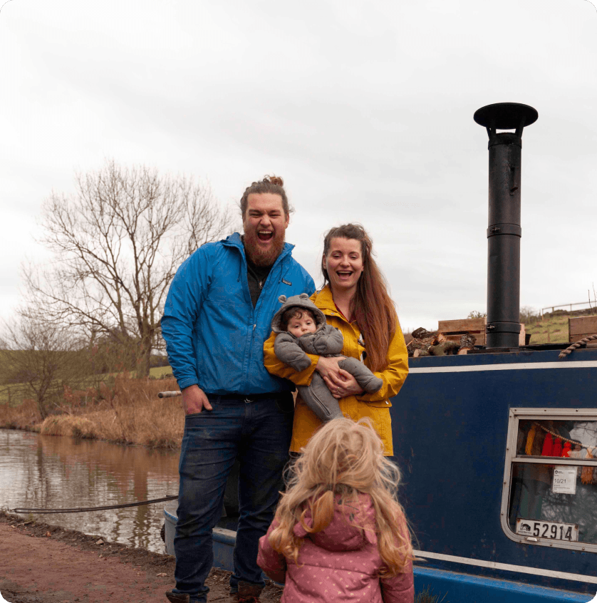 The Owners of Roam And Roost Holidays outside their canal boat