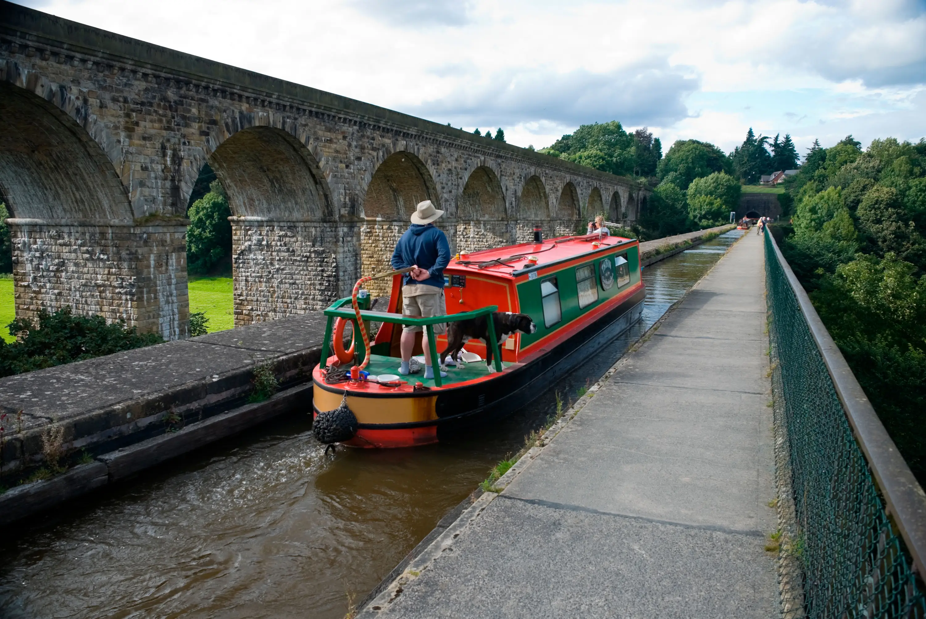 A narrowboat passing over Chrik aqueduct on a Llangollen canal boat hire